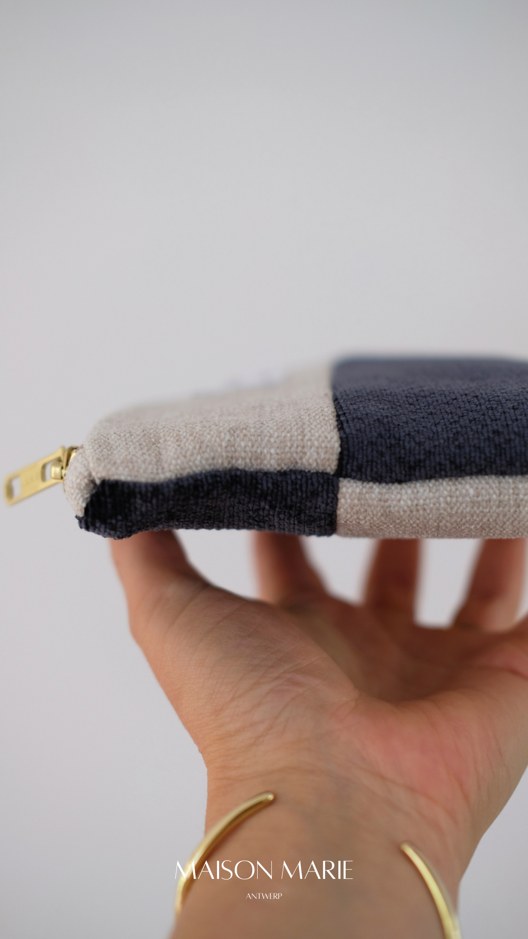 Pochette Limited Edition marineblauw - beige