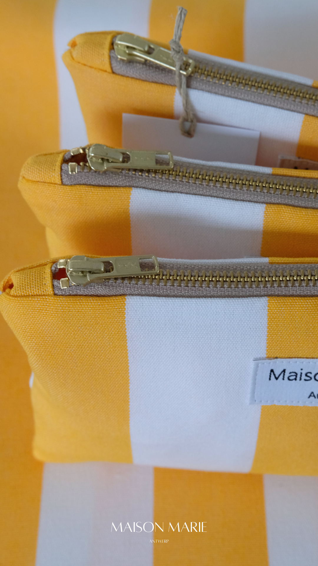 Pochette Limited Edition streep geel - wit